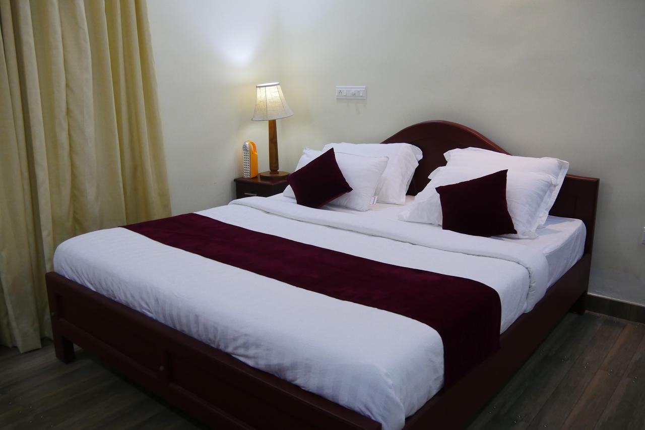 Hotel Mango Meadows Kottayam Esterno foto