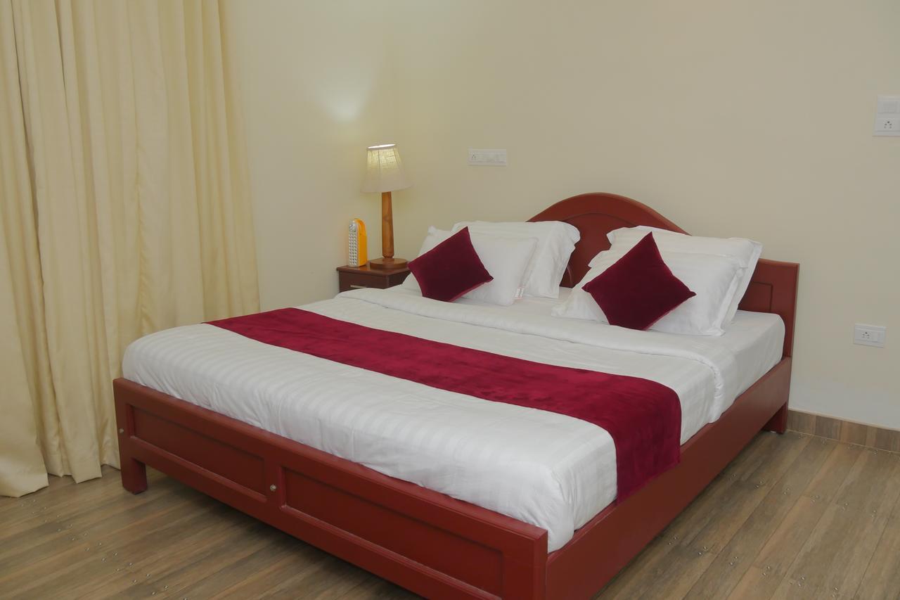 Hotel Mango Meadows Kottayam Esterno foto