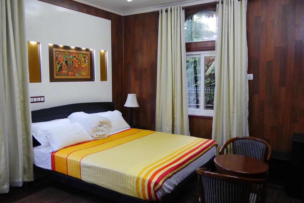 Hotel Mango Meadows Kottayam Esterno foto