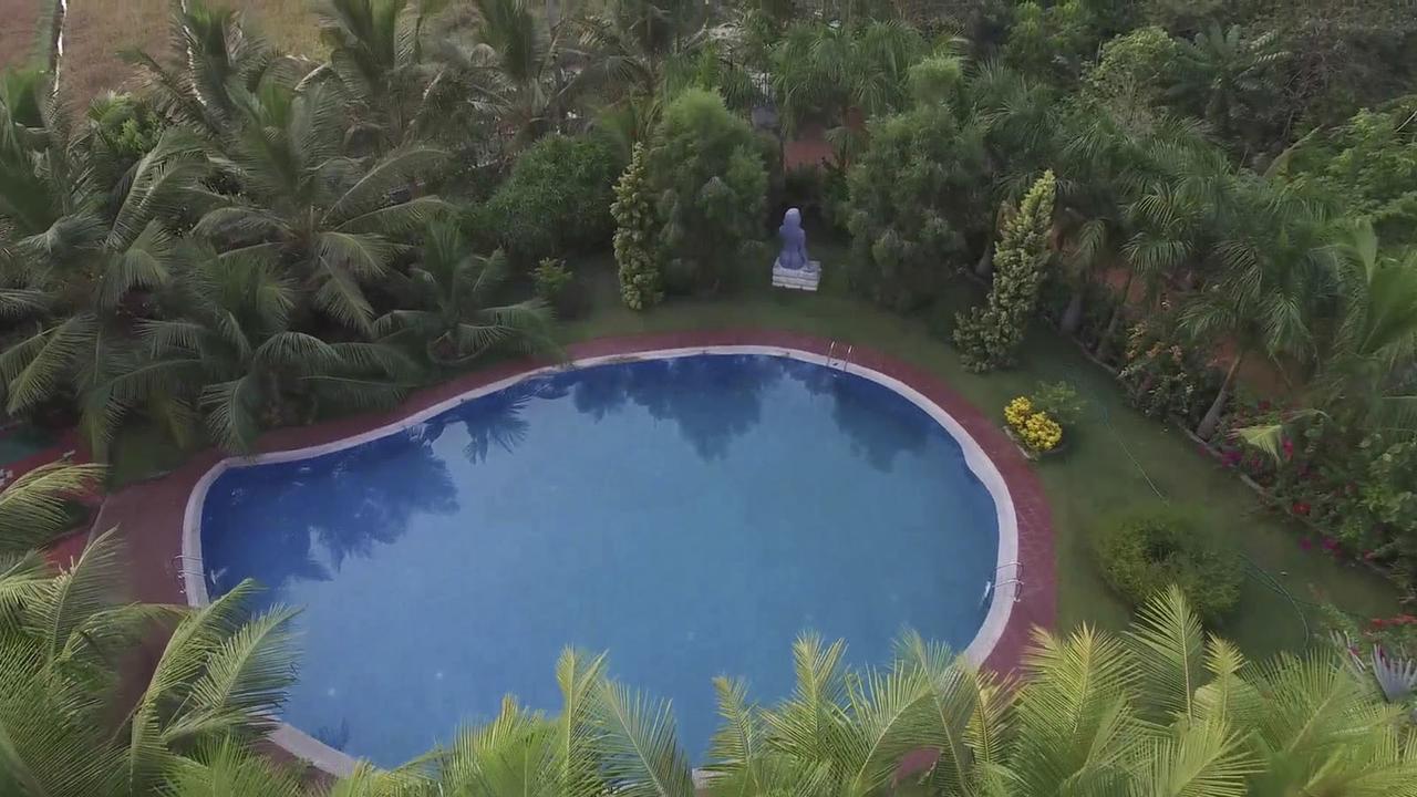 Hotel Mango Meadows Kottayam Esterno foto
