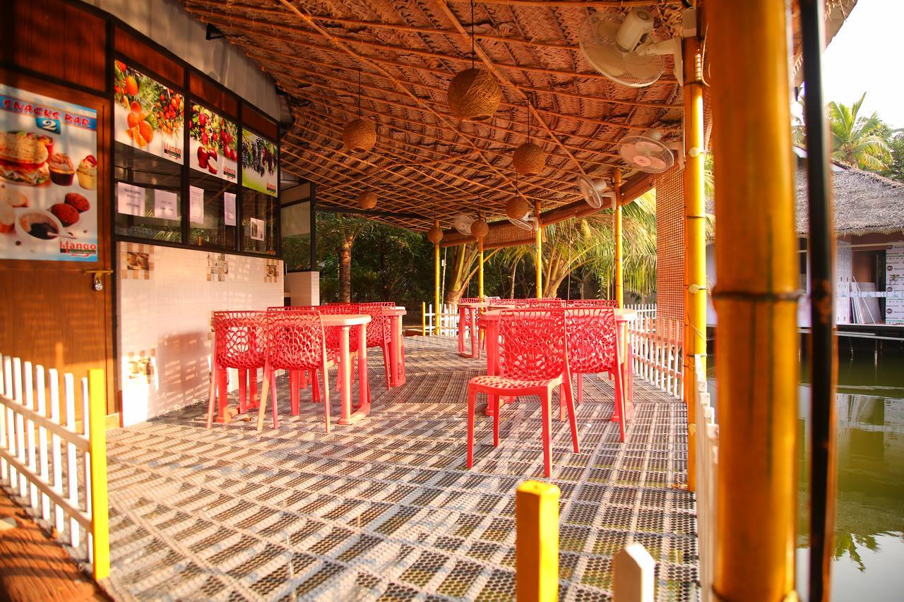 Hotel Mango Meadows Kottayam Esterno foto