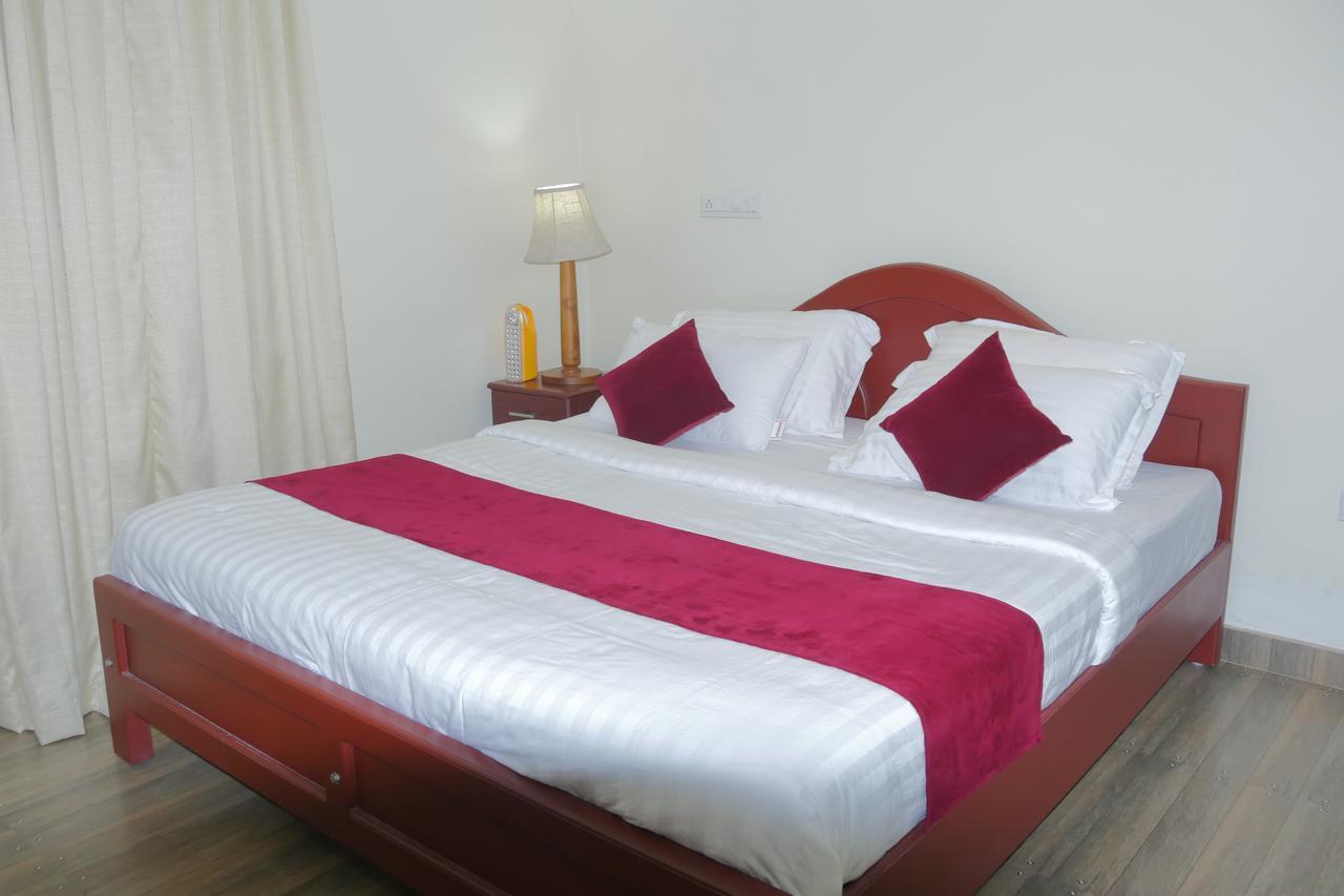Hotel Mango Meadows Kottayam Esterno foto